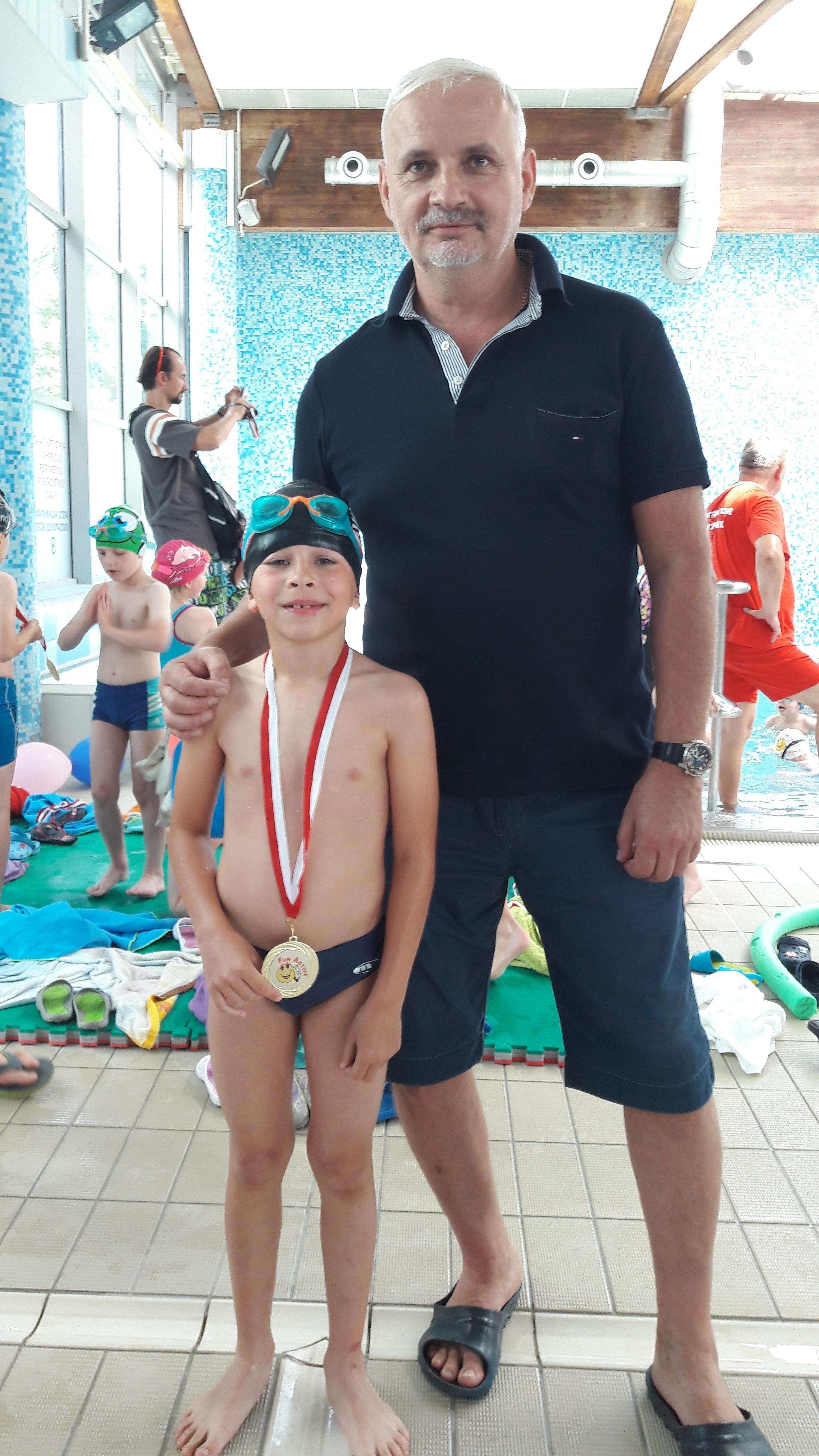 Podopieczny szkoły pływania SWIMTOM po zajęciach dla dzieci
